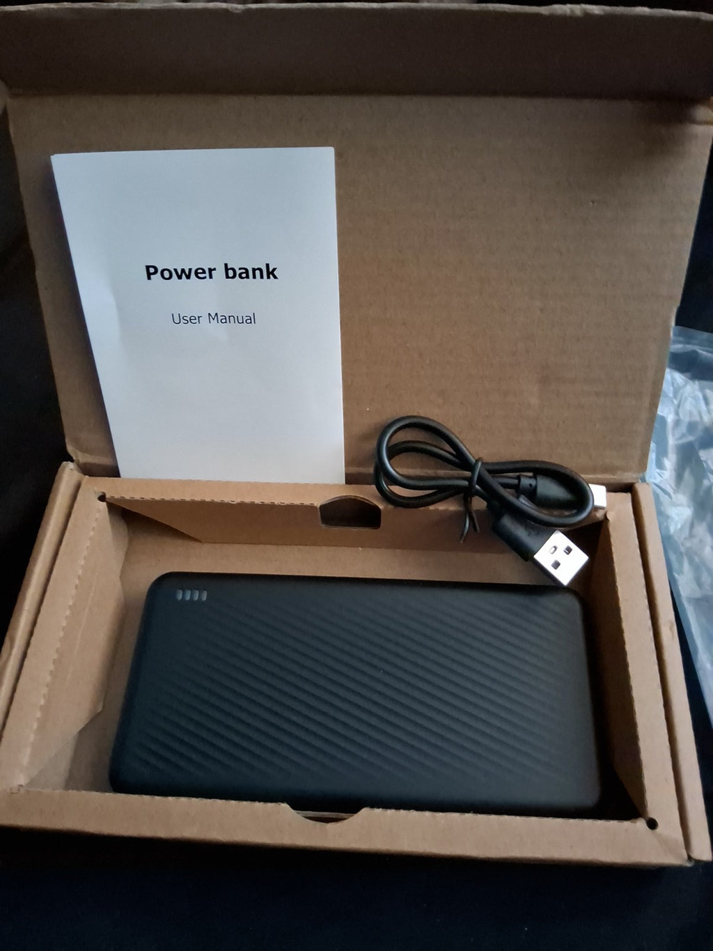 This appears to be a 20,000mAh portable charger power bank, similar to models...