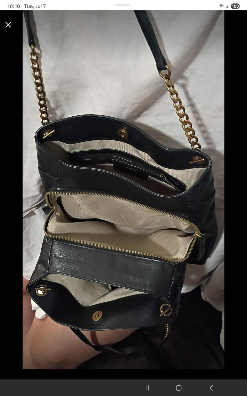 Magnetic snap at main entry, slip pocket with magnetic snap, chain strap, antiqu
