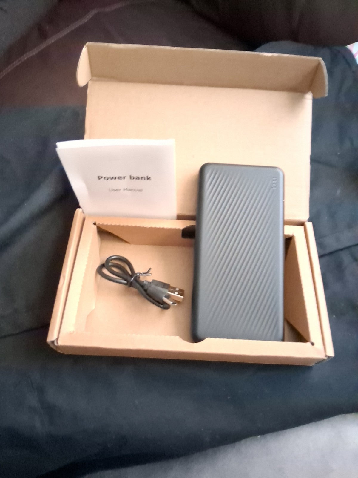 This appears to be a 20,000mAh portable charger power bank, similar to models...
