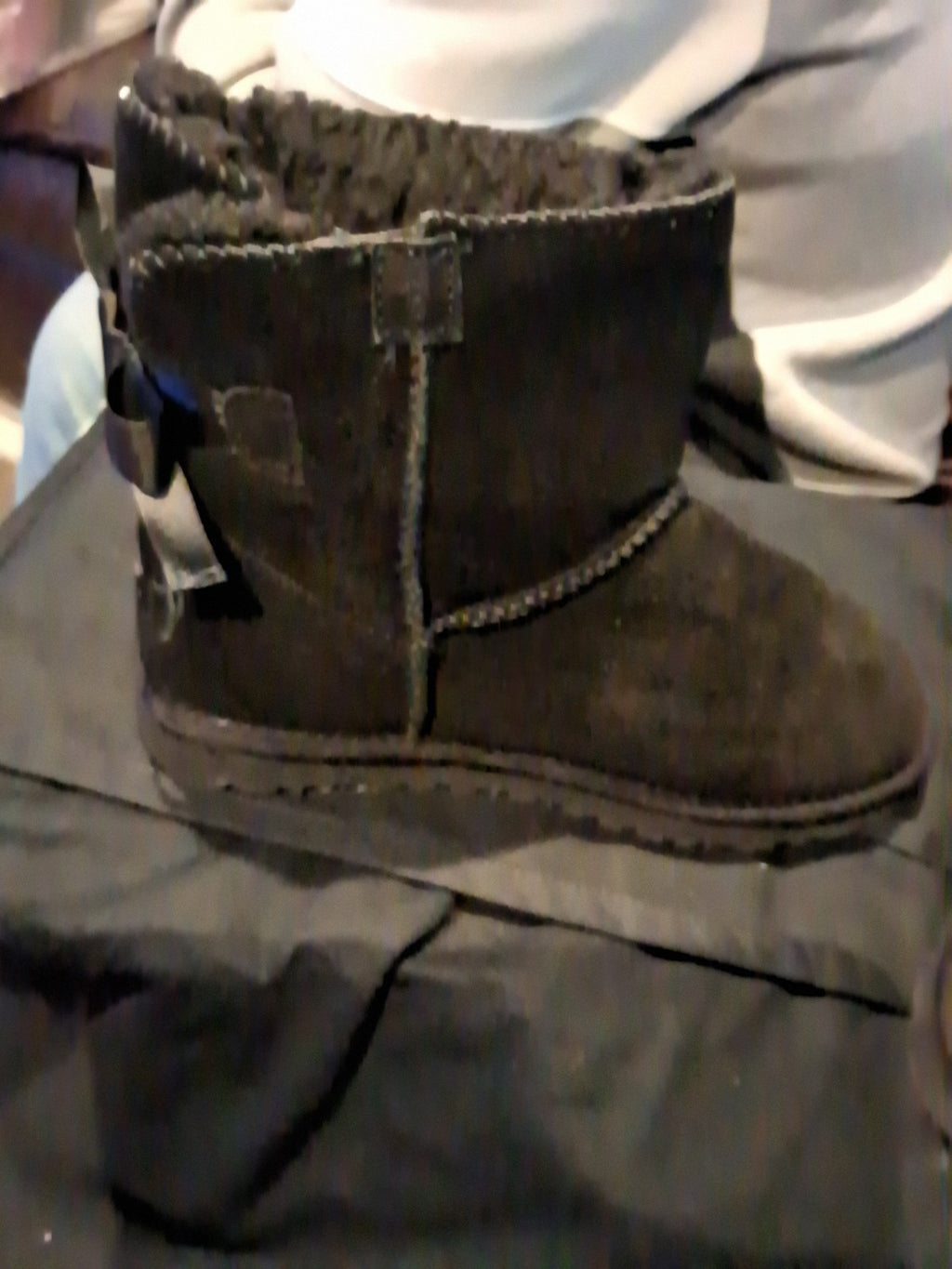The UGG Bailey Bow II boots are a stylish addition to any wardrobe.