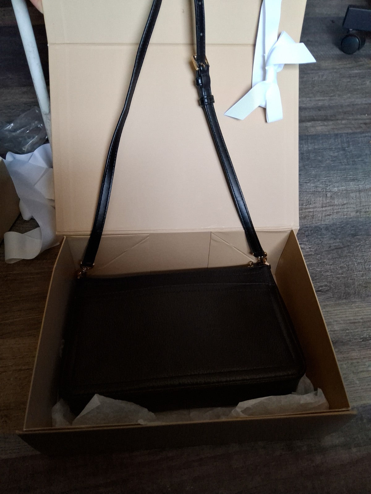 Michael Kors Black Leather Crossbody Bag with Gold MK Logo and Adjustable Strap