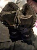 The UGG Bailey Bow II boots are a stylish addition to any wardrobe.