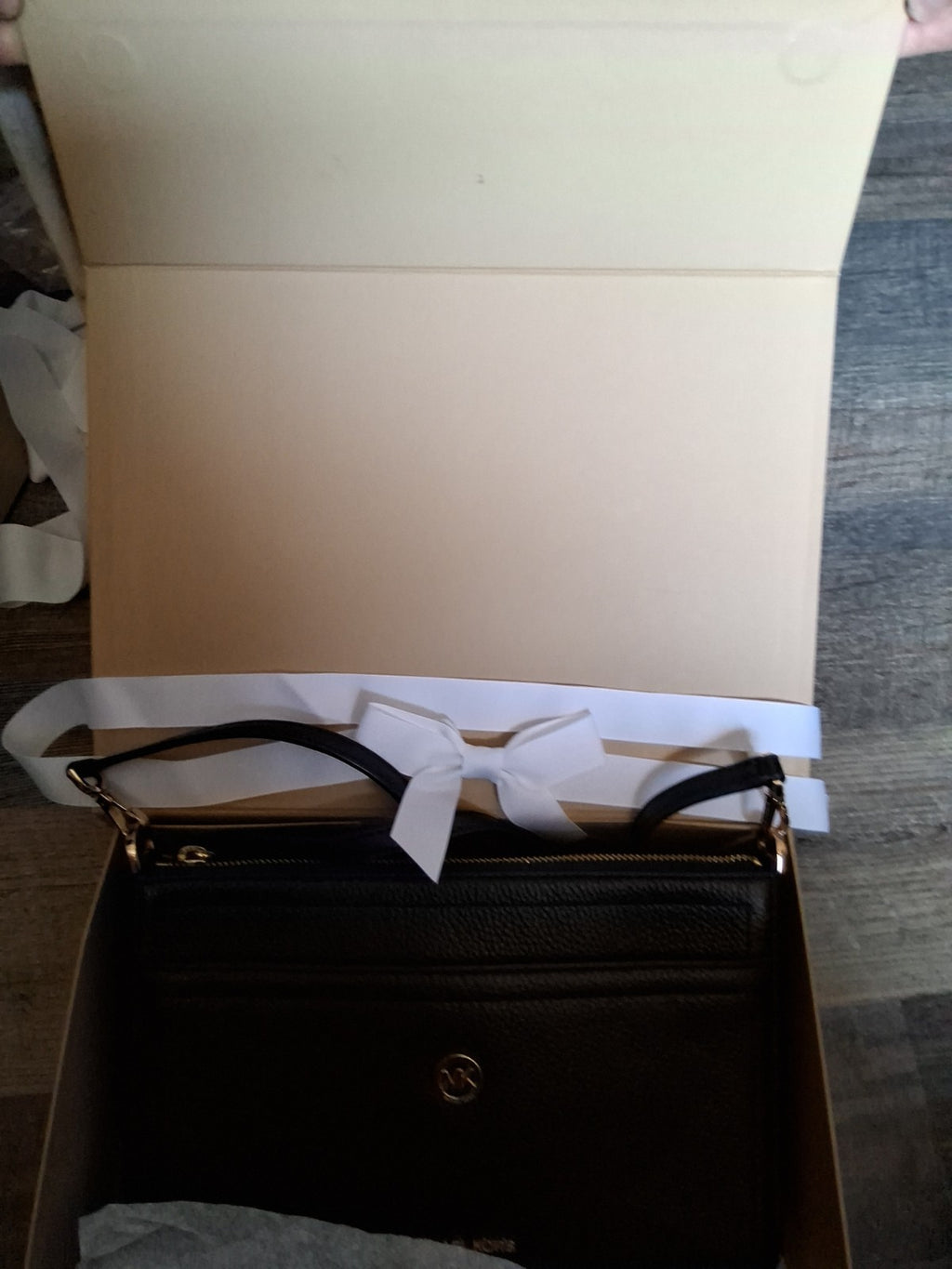 Michael Kors Black Leather Crossbody Bag with Gold MK Logo and Adjustable Strap