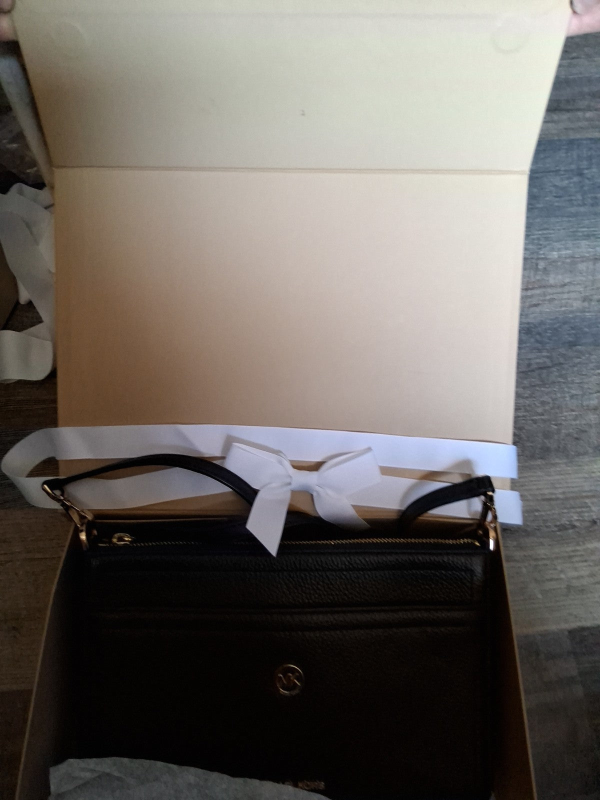 Michael Kors Black Leather Crossbody Bag with Gold MK Logo and Adjustable Strap