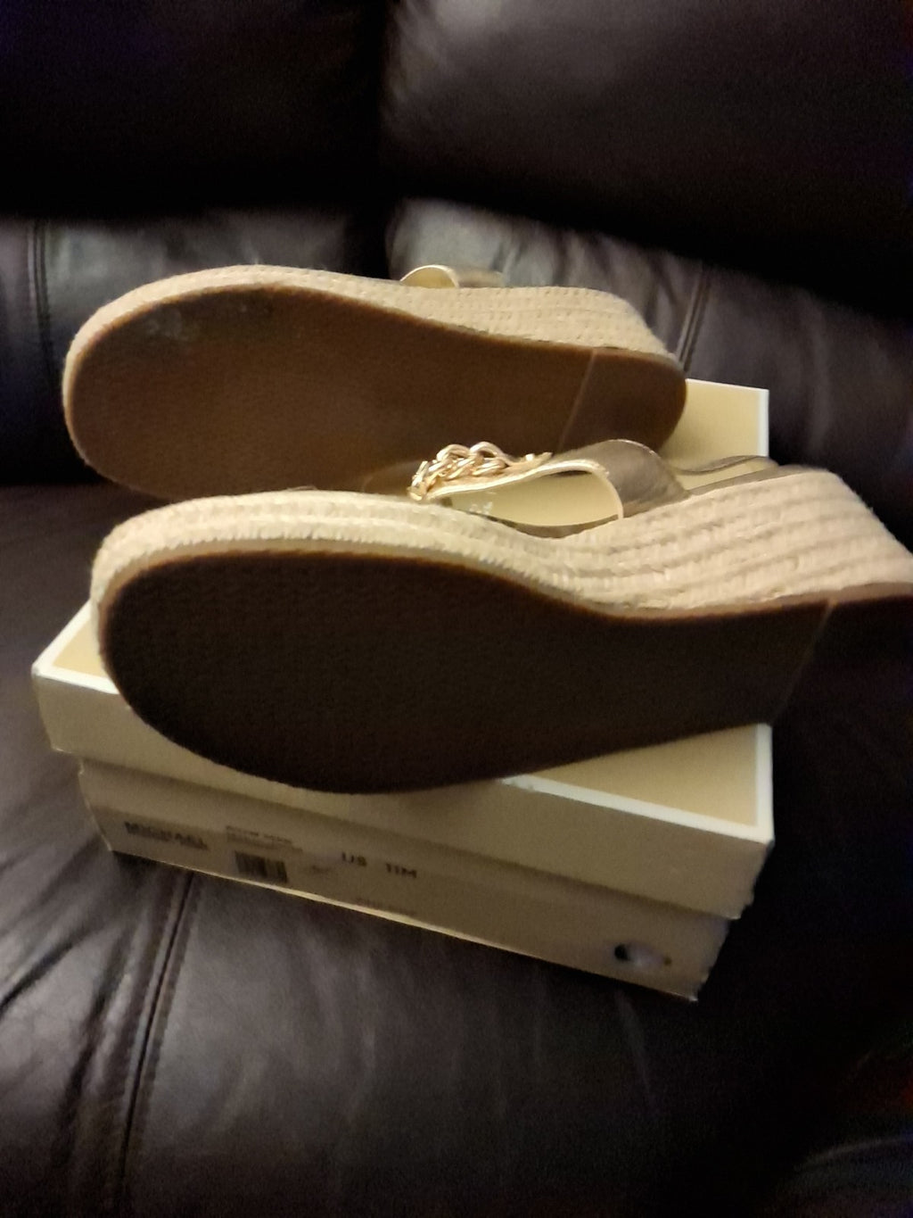 Michael Kors Roxane Wedge Sandals In A Pale Gold Metallic Finish Featuring Logo