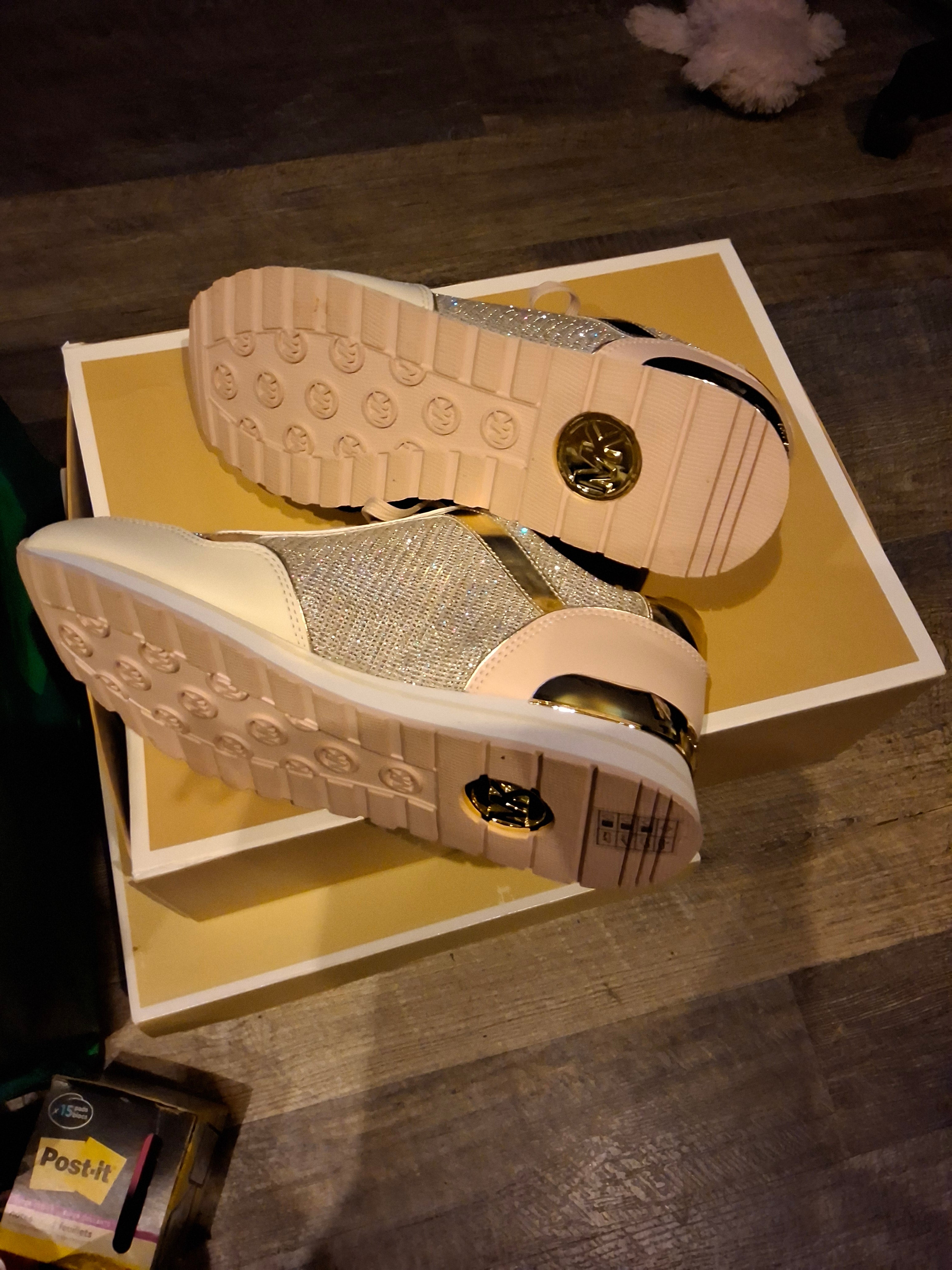 The Michael Kors Maddy Trainer is a sport-luxe low-top sneaker designed with a signature glam-athleisure aesthetic. #69