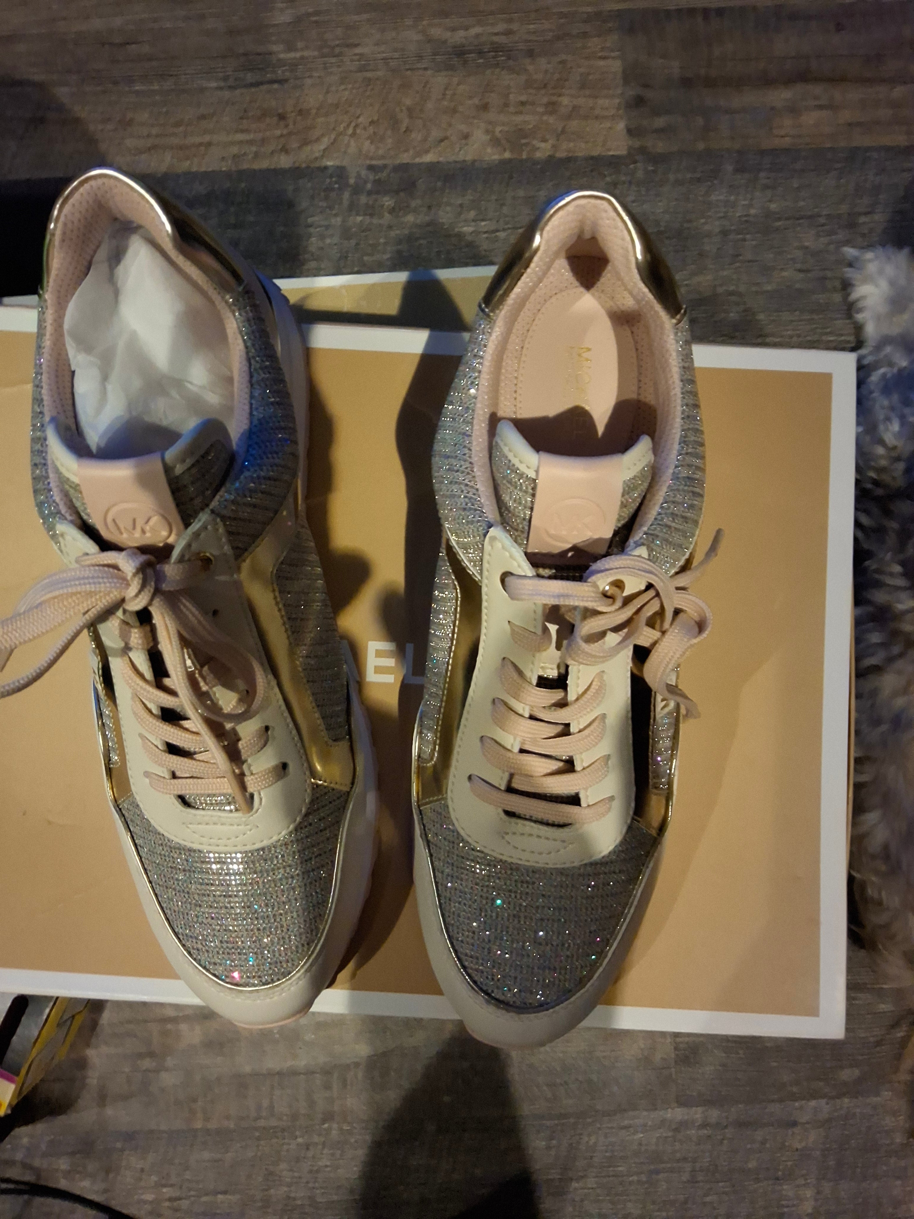 The Michael Kors Maddy Trainer is a sport-luxe low-top sneaker designed with a signature glam-athleisure aesthetic. #69